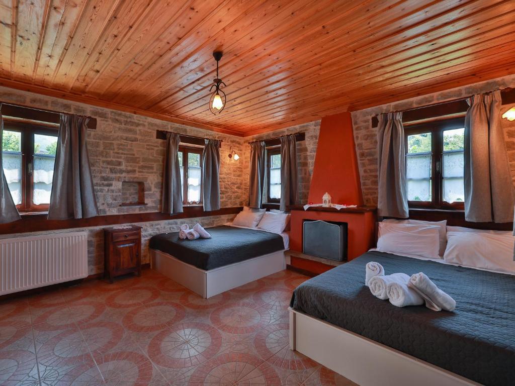 Postel nebo postele na pokoji v ubytování Agriogido - Rupicapra Villas
