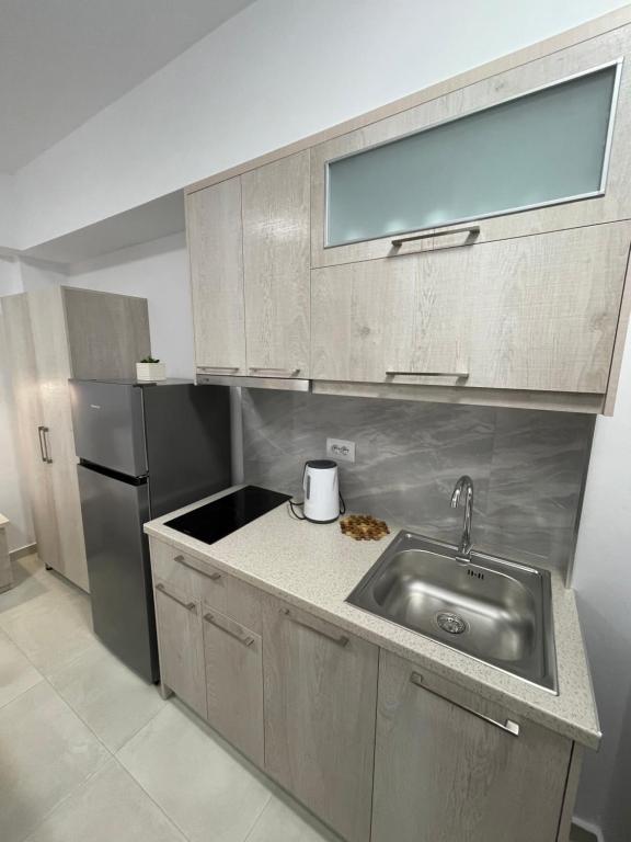 Kuchyň nebo kuchyňský kout v ubytování Villa Egli Ksamil