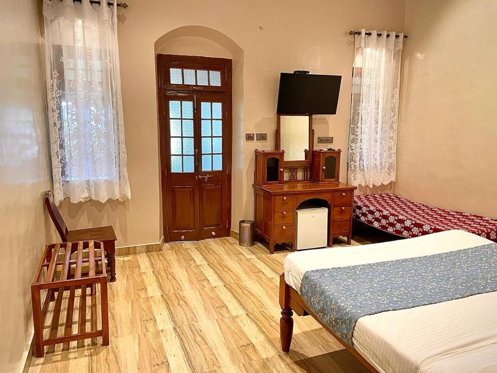 Postel nebo postele na pokoji v ubytování Hotel Mount View Heritage