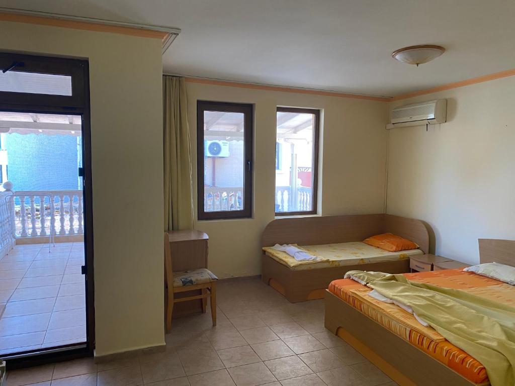 Postel nebo postele na pokoji v ubytování Hotel Apart