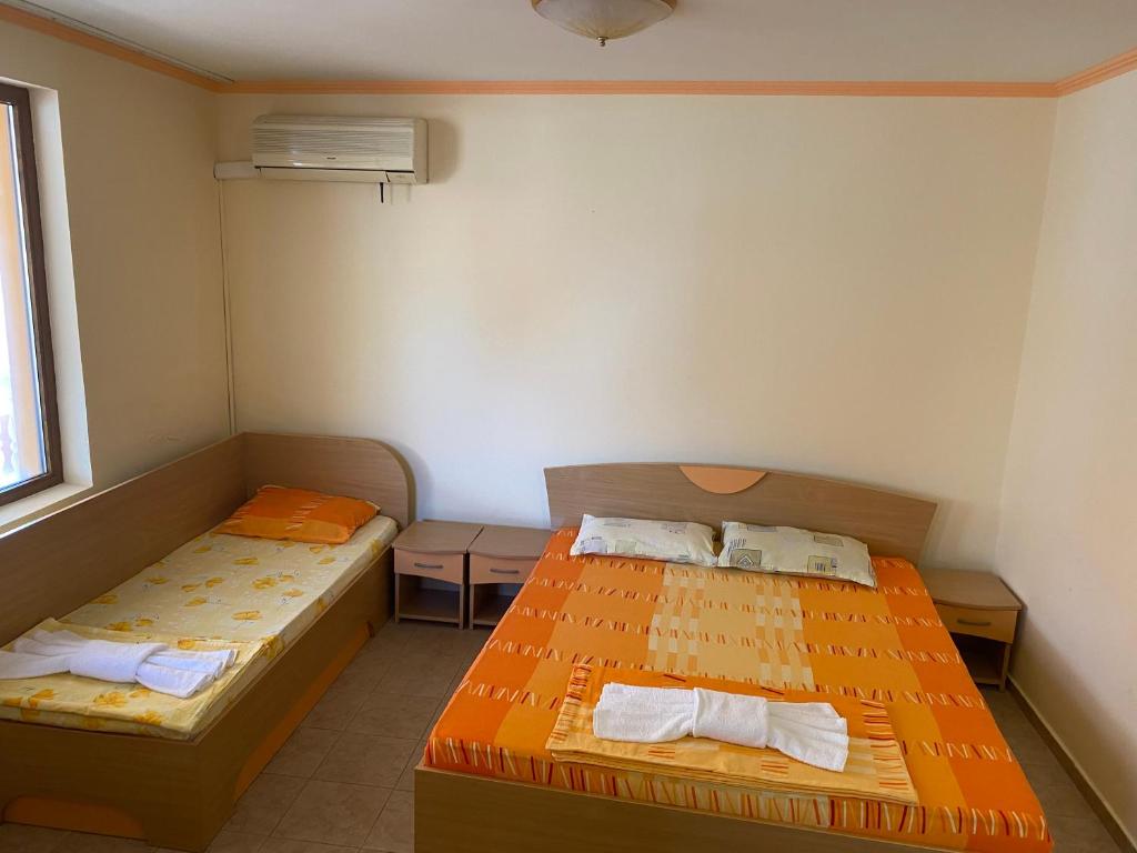 Postel nebo postele na pokoji v ubytování Hotel Apart