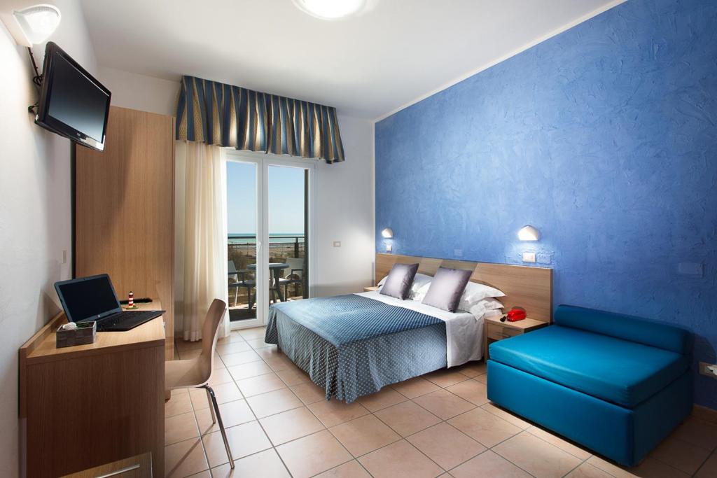 Postel nebo postele na pokoji v ubytování Hotel Souvenir - Koolibry Hotels