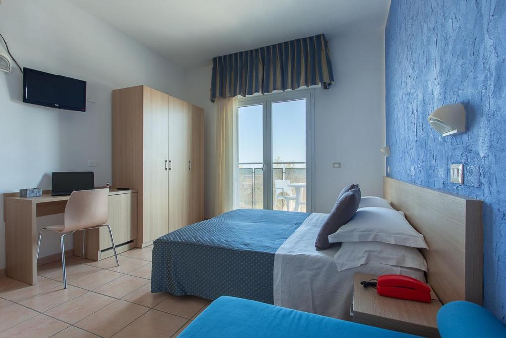 Postel nebo postele na pokoji v ubytování Hotel Souvenir - Koolibry Hotels