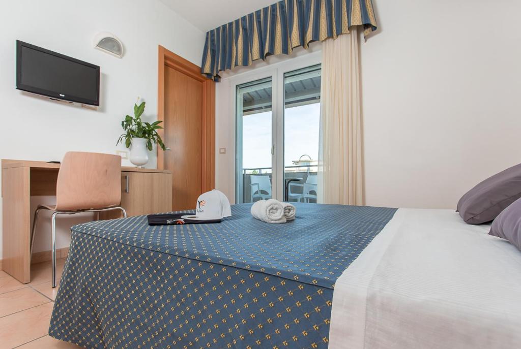 Postel nebo postele na pokoji v ubytování Hotel Souvenir - Koolibry Hotels