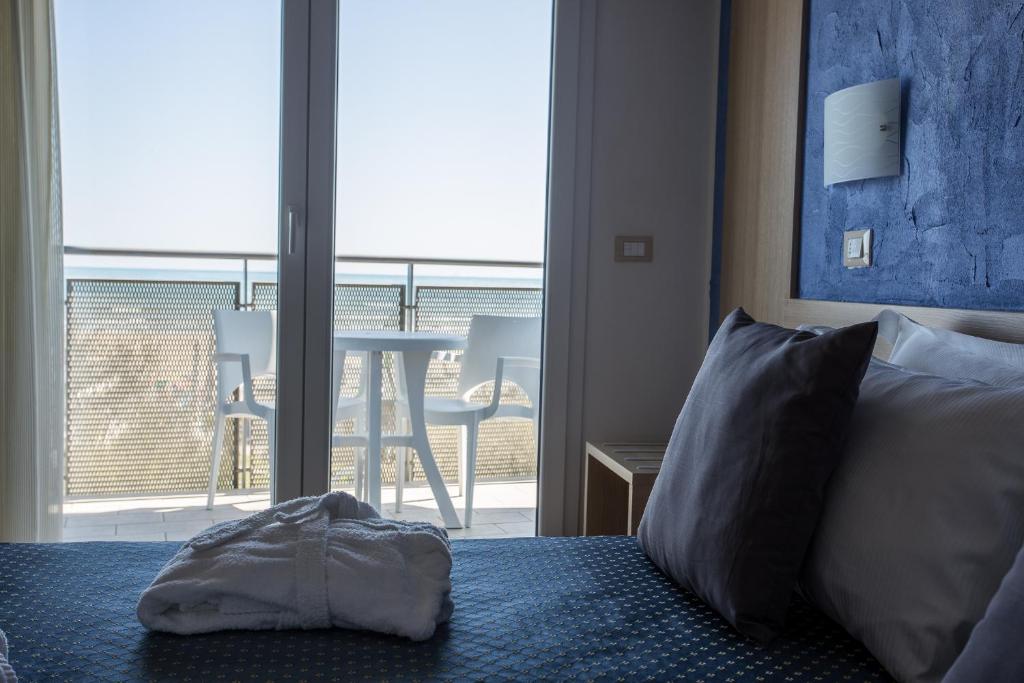 Postel nebo postele na pokoji v ubytování Hotel Souvenir - Koolibry Hotels