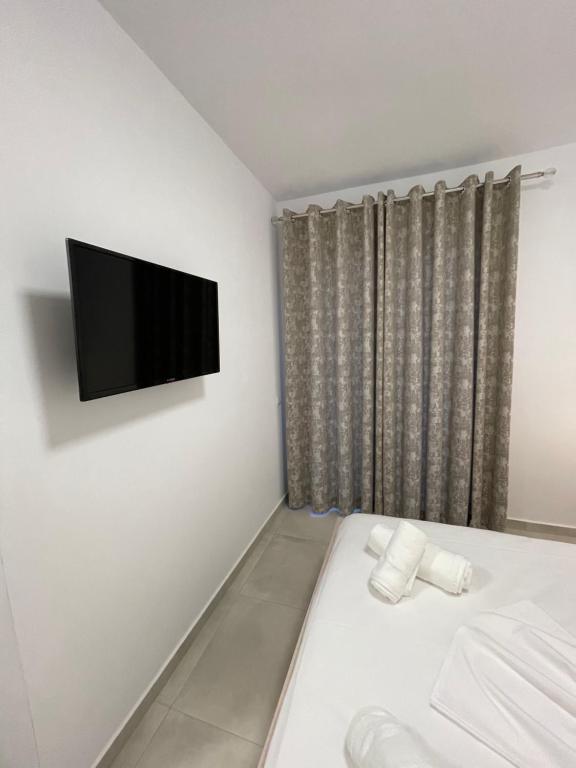 TV a/nebo společenská místnost v ubytování Villa Egli Ksamil