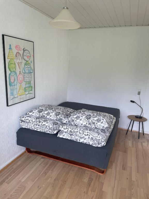 Postel nebo postele na pokoji v ubytování Feriehus-Gammel Byvej, Vrensted