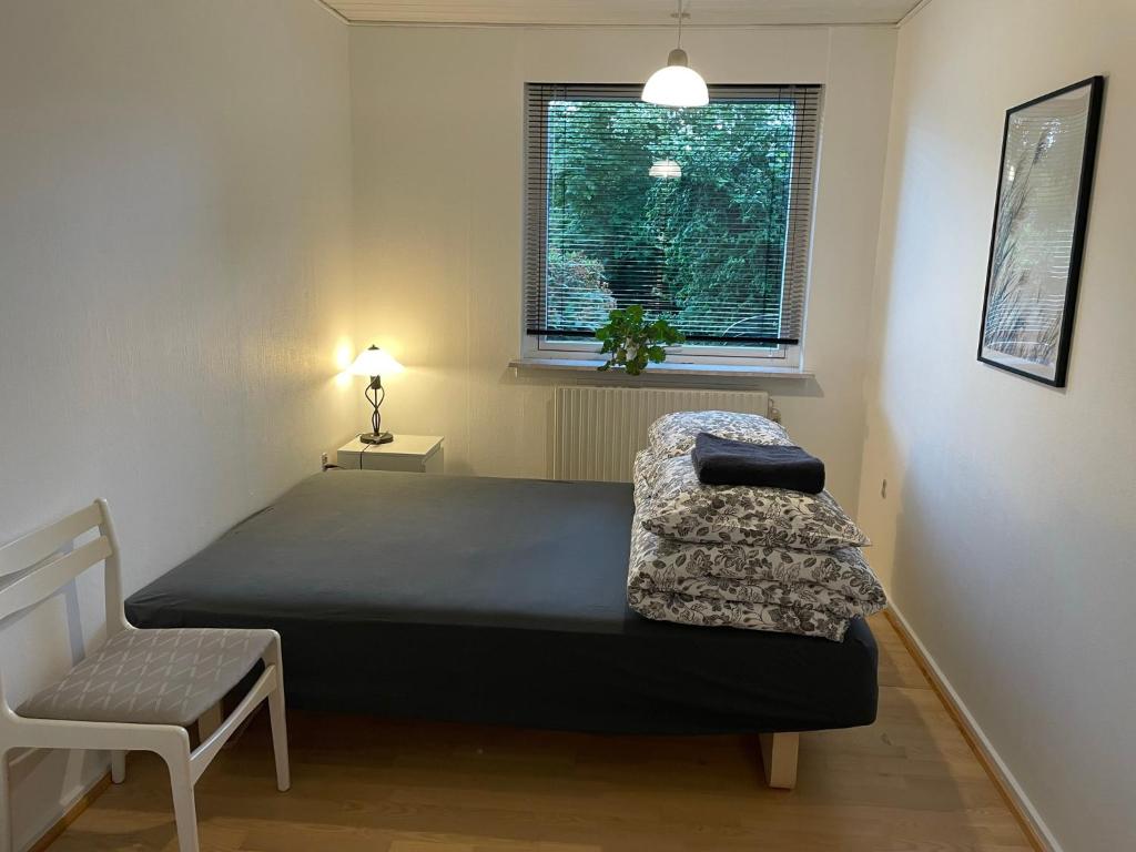 Postel nebo postele na pokoji v ubytování Feriehus-Gammel Byvej, Vrensted