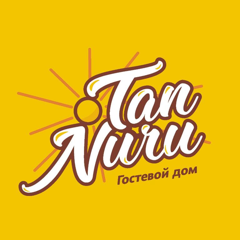 a sign for a tea shop with the text tea ninja at Tan Nuru Guest House Гостевой Дом Тан Нуру in Cholpon-Ata