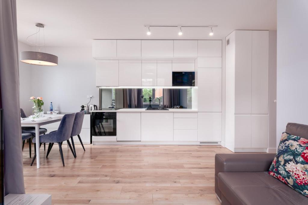 Kuchyň nebo kuchyňský kout v ubytování Pure Rental Apartments