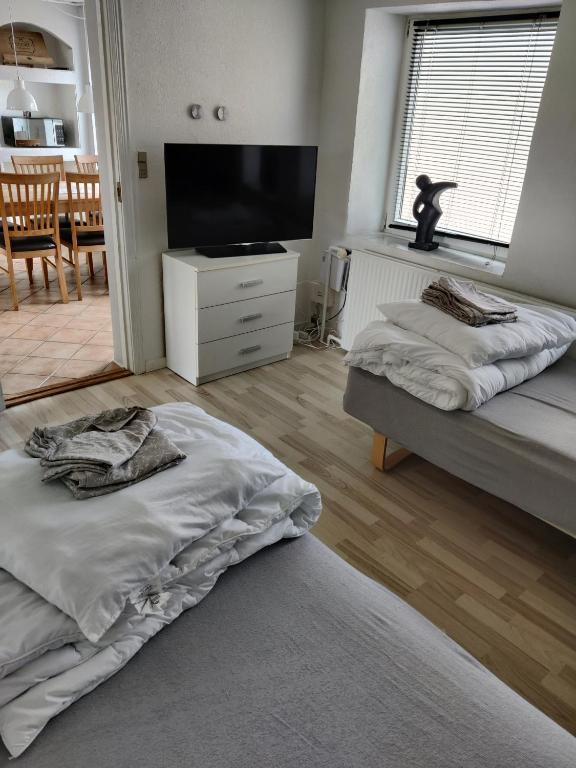 Postel nebo postele na pokoji v ubytování 210 m2 hus til 8 gæster - 5 km fra nyt stort vandland