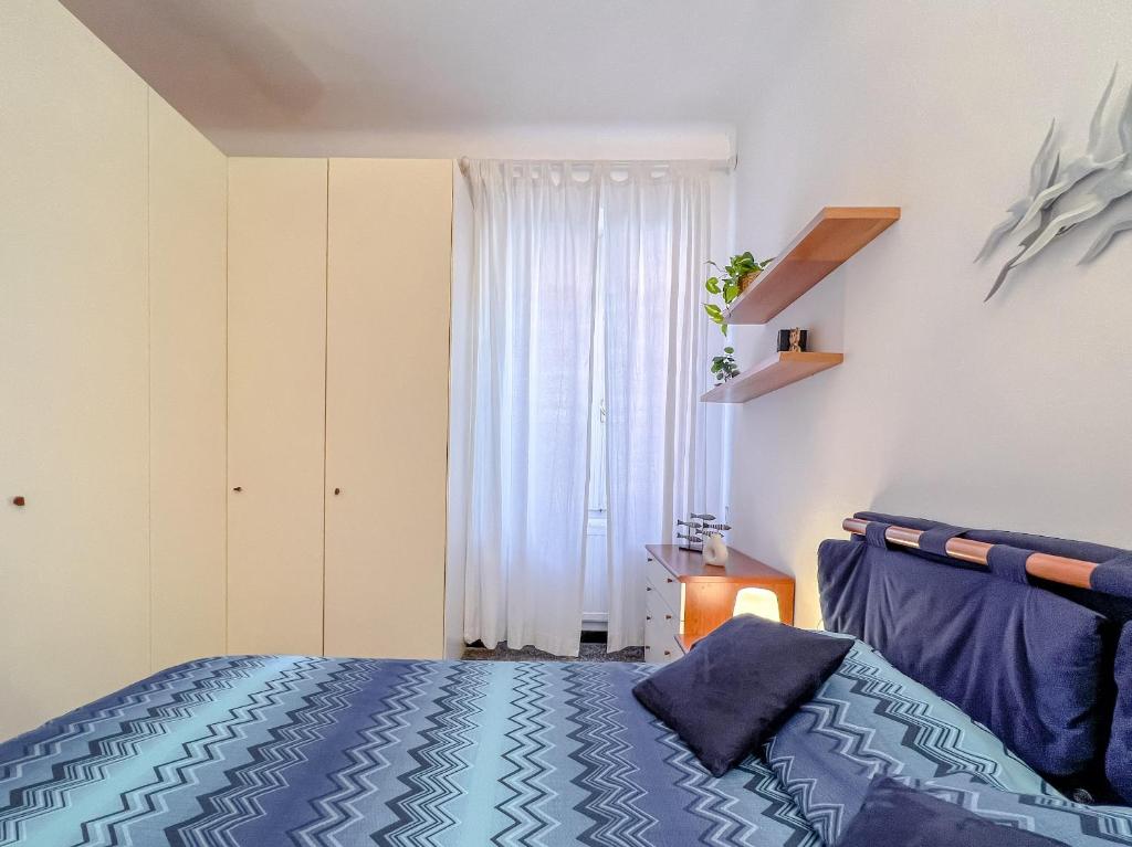 Łóżko lub łóżka w pokoju w obiekcie Grande appartamento in zona tranquilla
