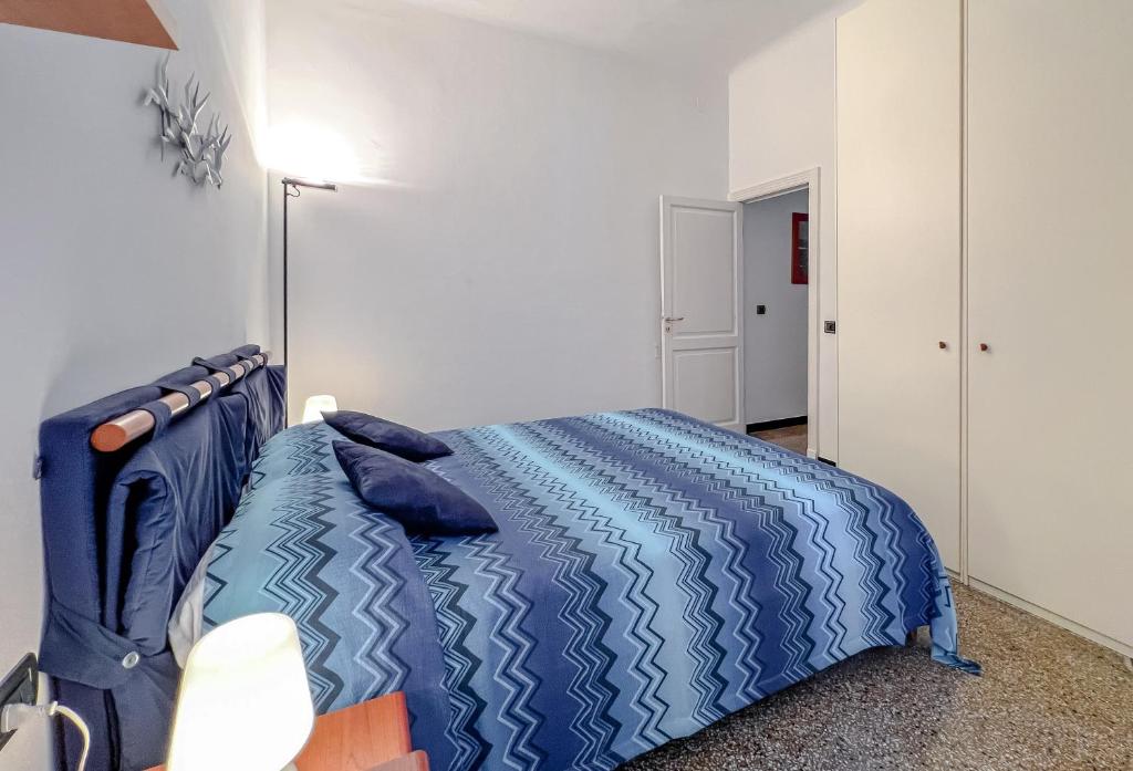 Łóżko lub łóżka w pokoju w obiekcie Grande appartamento in zona tranquilla