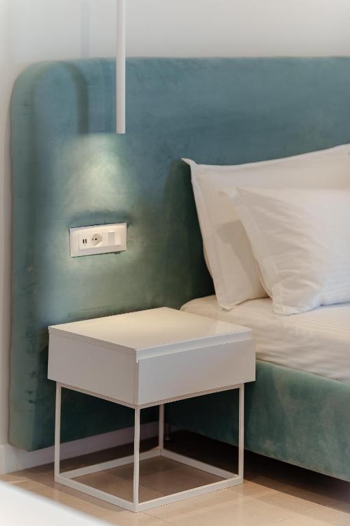 Postel nebo postele na pokoji v ubytování Artis Blue Relax