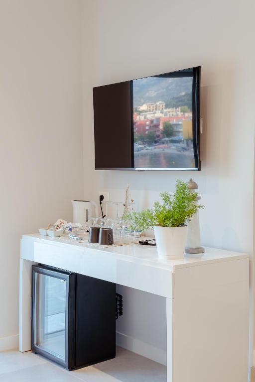 TV a/nebo společenská místnost v ubytování Artis Blue Relax