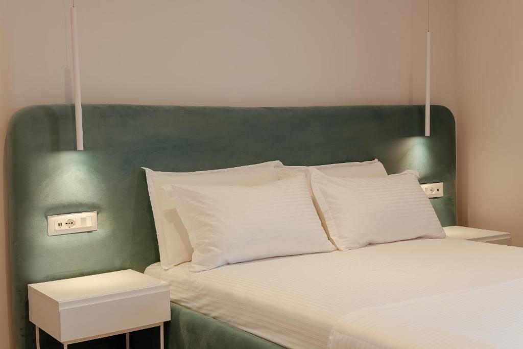 Postel nebo postele na pokoji v ubytování Artis Blue Relax