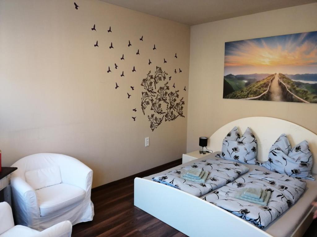 Postel nebo postele na pokoji v ubytování Ferienhaus Heideck