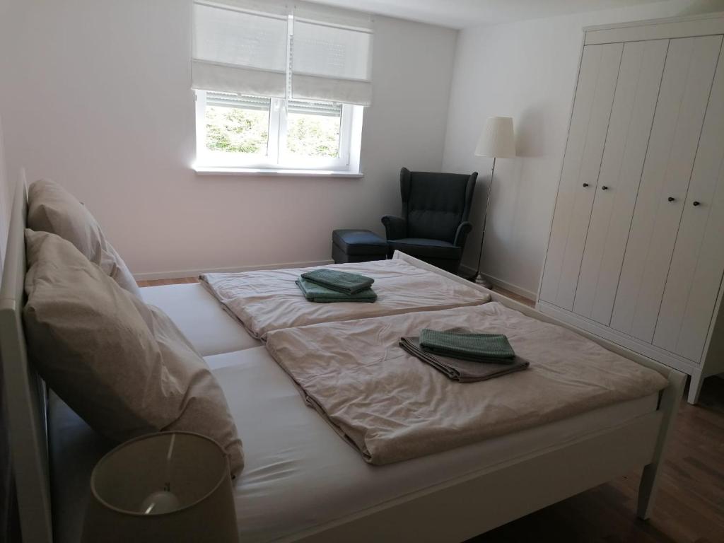Postel nebo postele na pokoji v ubytování Ferienwohnung Auengrund