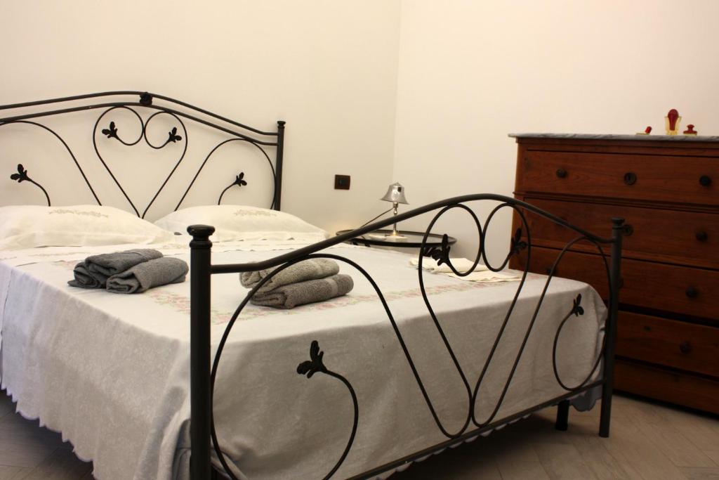 Postel nebo postele na pokoji v ubytování [Appartamento Centro Storico] Da nonna Maria ☆☆☆☆☆