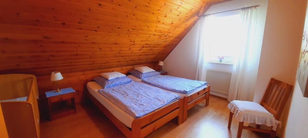 Postel nebo postele na pokoji v ubytování Ferienhaus Hooksiel