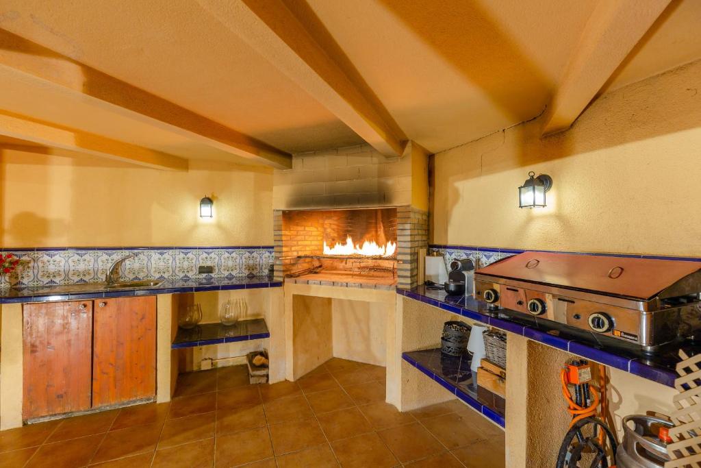 Kuchyň nebo kuchyňský kout v ubytování Harmony Villa by Fidalsa