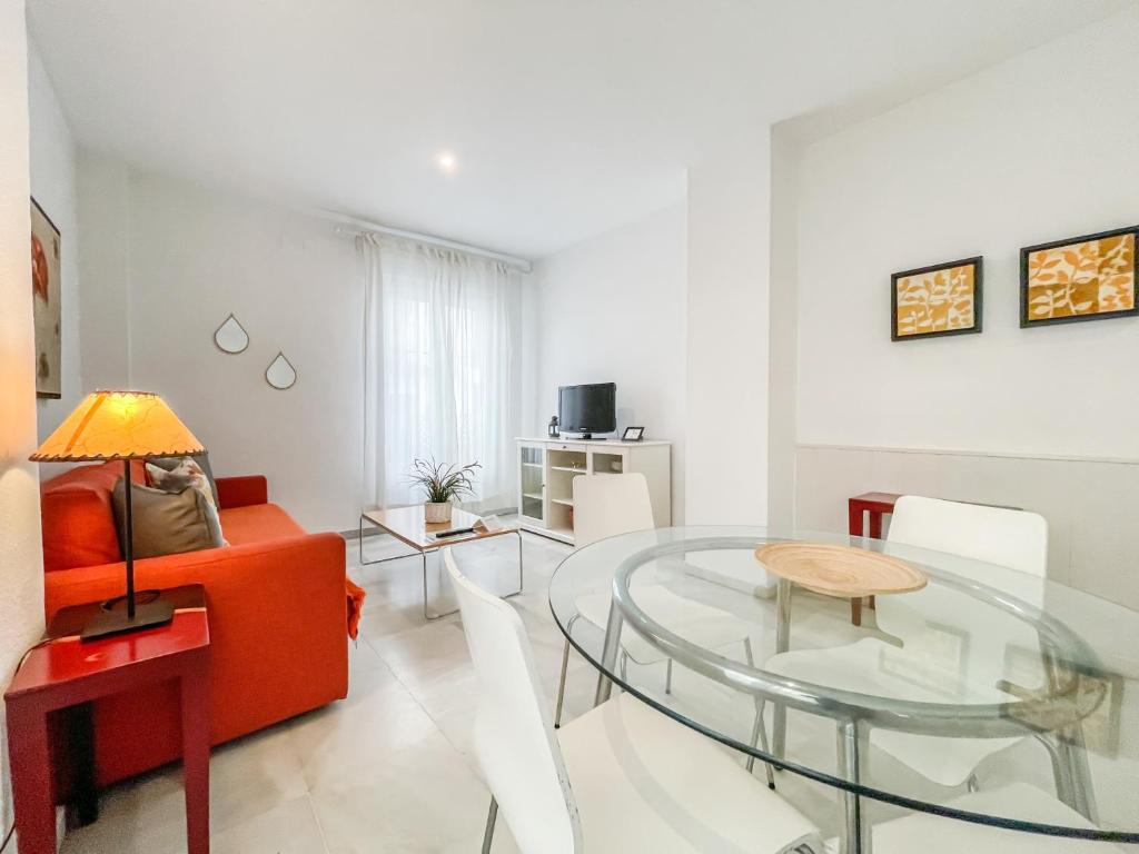 Televízia a/alebo spoločenská miestnosť v ubytovaní San Marcos Apartamentos