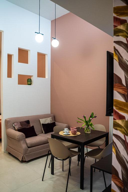 A seating area at MATE' APARTMENTS - FREE WIFI & AIR CONDITIONAL - Molfetta, Puglia, Italy