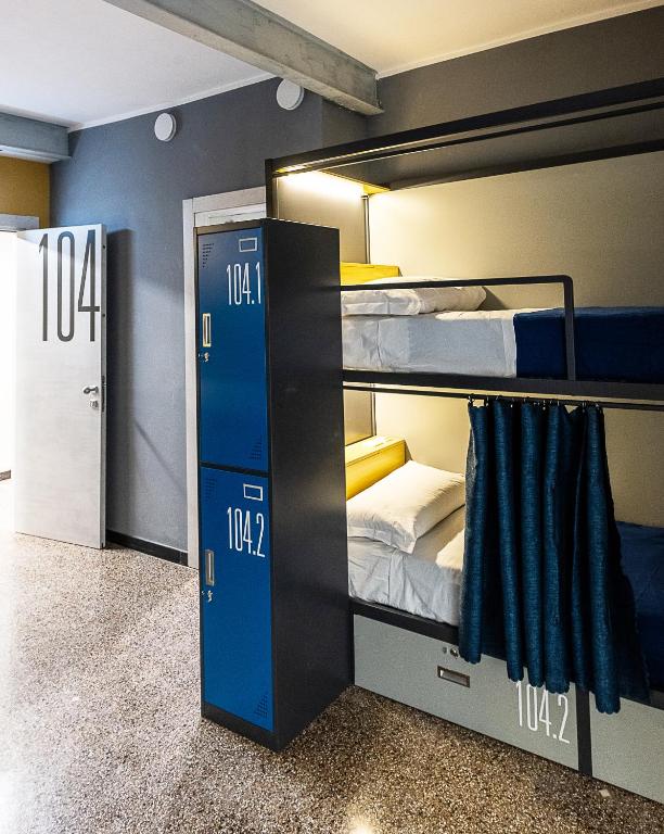 Postel nebo postele na pokoji v ubytování Marathon Hostel
