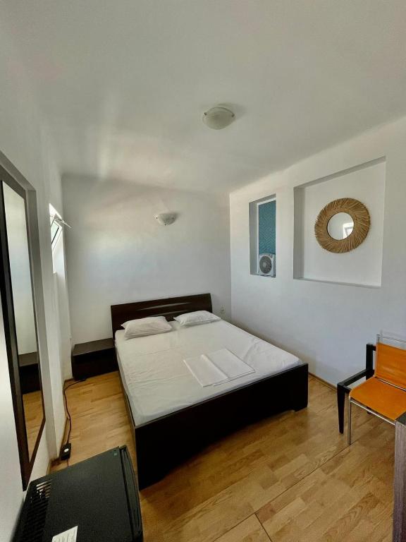 Postel nebo postele na pokoji v ubytování Hostel Cazino Nord Rooms