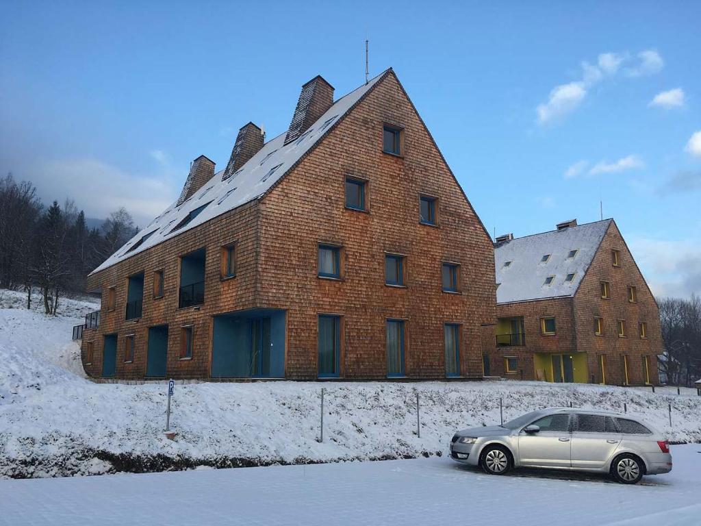 Apartmán u sjezdovky v zimě