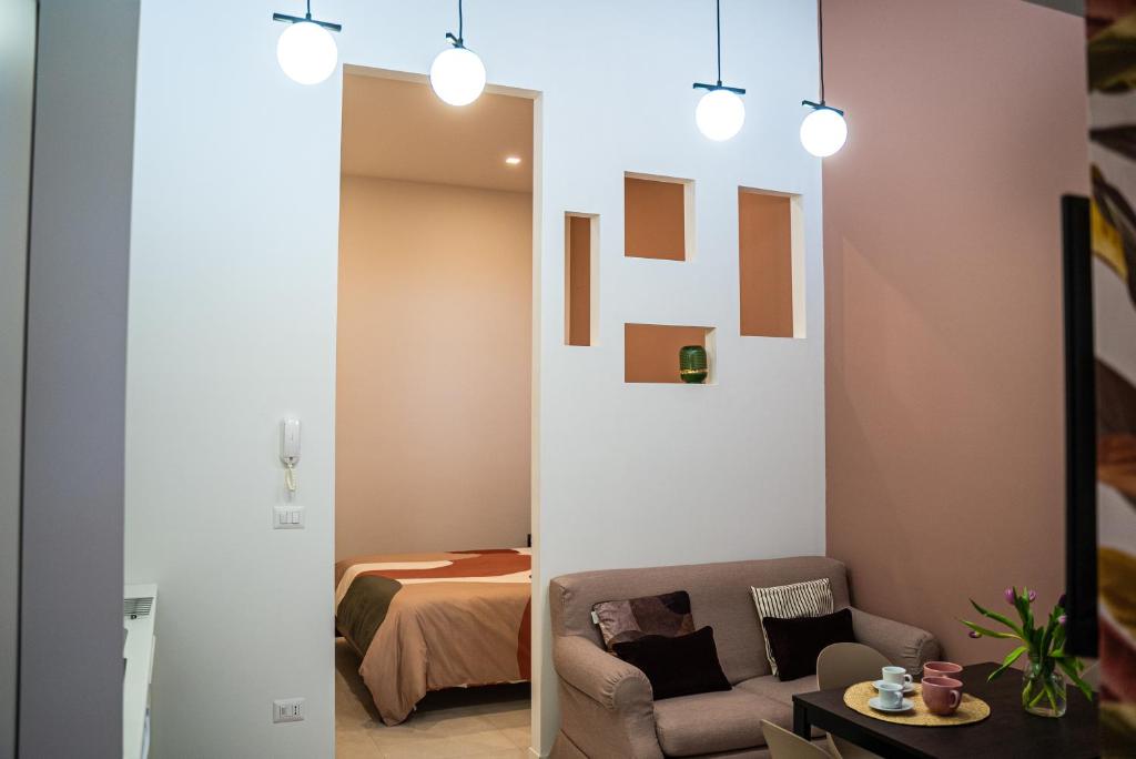 A seating area at MATE' APARTMENTS - FREE WIFI & AIR CONDITIONAL - Molfetta, Puglia, Italy