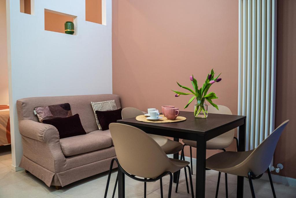 A seating area at MATE' APARTMENTS - FREE WIFI & AIR CONDITIONAL - Molfetta, Puglia, Italy