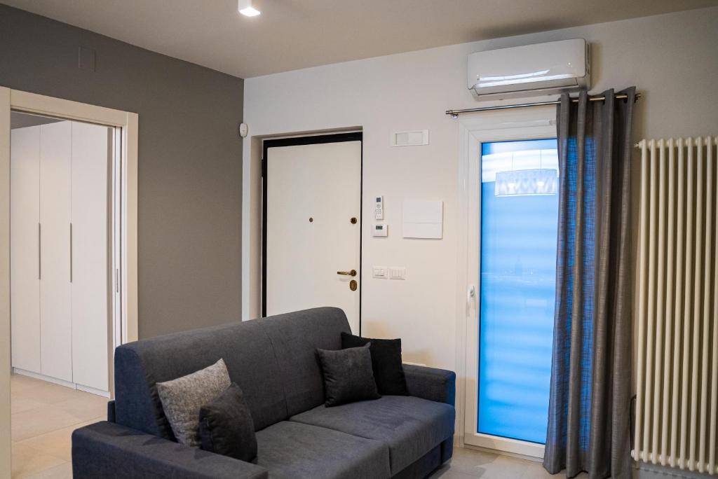 A seating area at MATE' APARTMENTS - FREE WIFI & AIR CONDITIONAL - Molfetta, Puglia, Italy