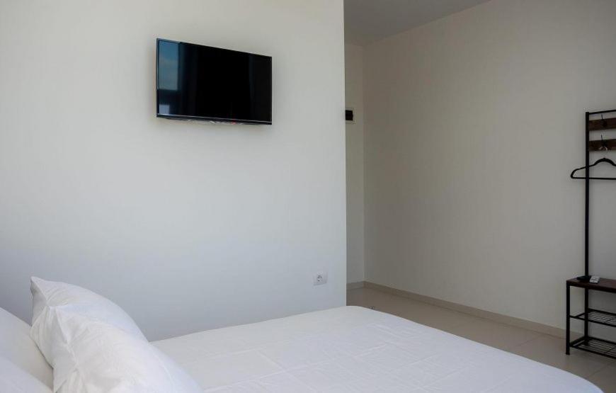 Postel nebo postele na pokoji v ubytování Sky Hotel
