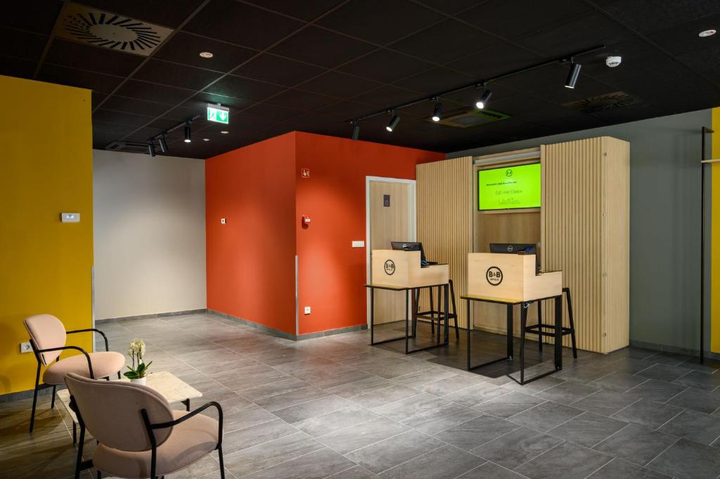 Kuchyň nebo kuchyňský kout v ubytování B&B Hotel Maribor