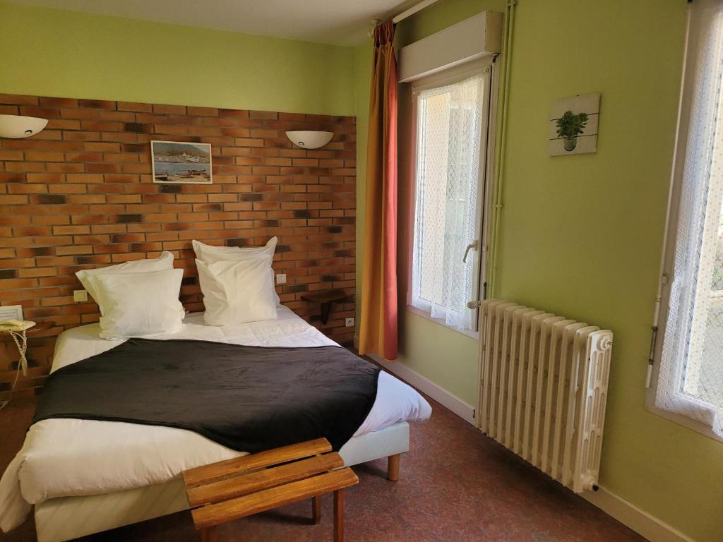 Posteľ alebo postele v izbe v ubytovaní L'AUBERGE DE L'OLIVE