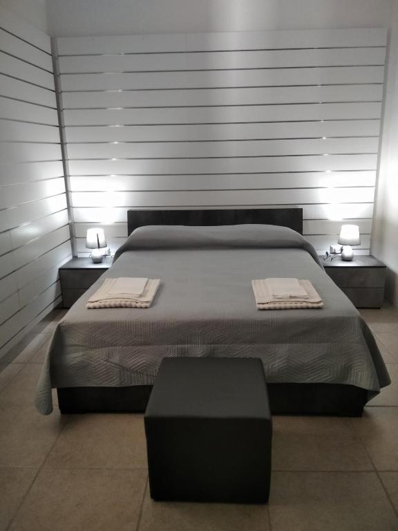 A bed or beds in a room at B&B Da Luca
