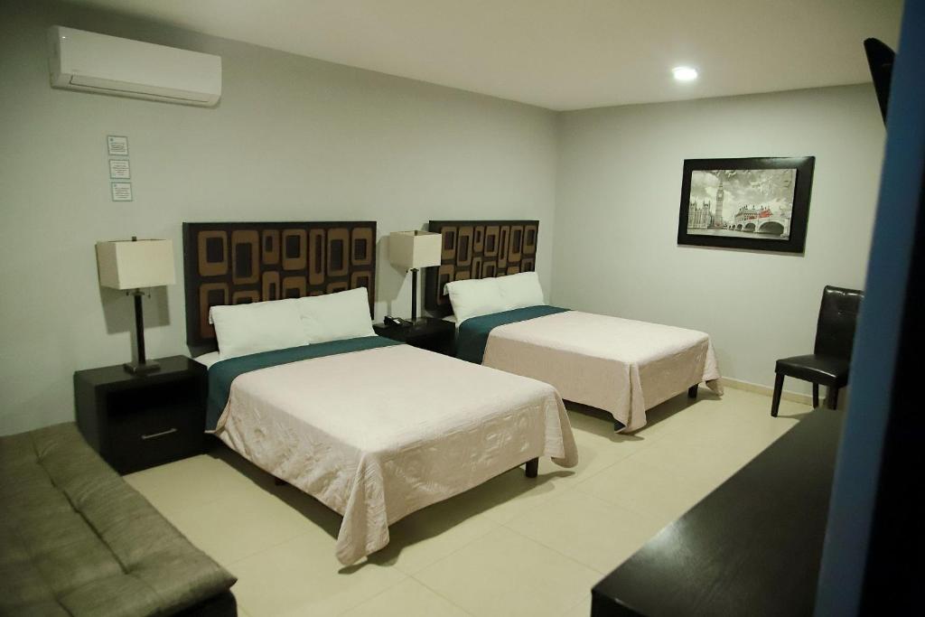 Postel nebo postele na pokoji v ubytování Hotel Boutique Boca - Veracruz