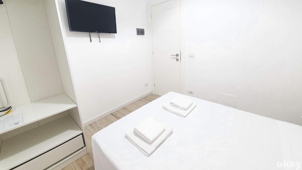 Posteľ alebo postele v izbe v ubytovaní 2B Home - Bari Centro