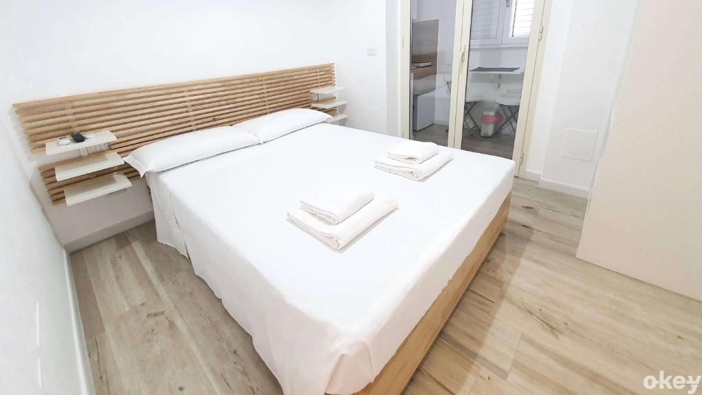 Posteľ alebo postele v izbe v ubytovaní 2B Home - Bari Centro