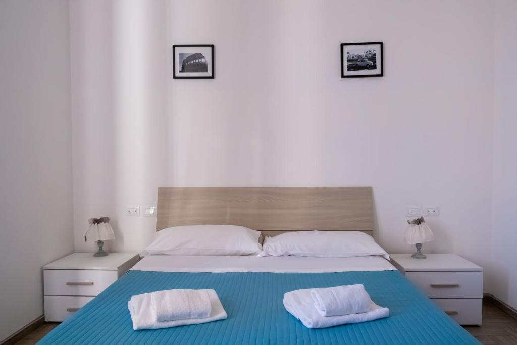 A bed or beds in a room at La residenza del Principe