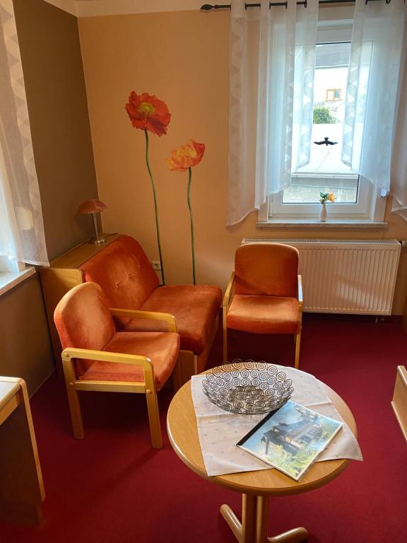 Posezení v ubytování Gasthaus und Pension Koch