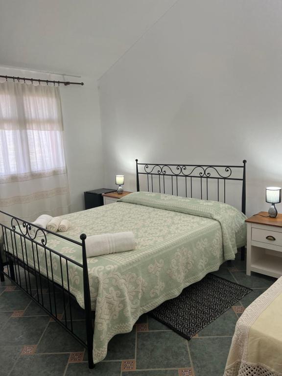 Voodi või voodid majutusasutuse Agriturismo Su Barraccu toas