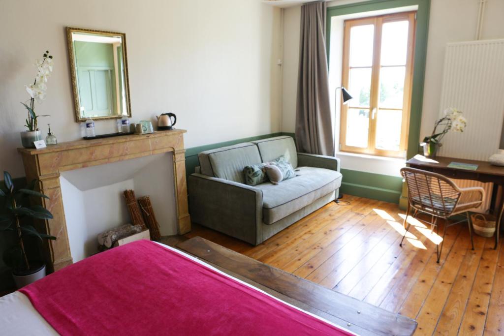 Postel nebo postele na pokoji v ubytování Arc en Sel Maison d’hôtes