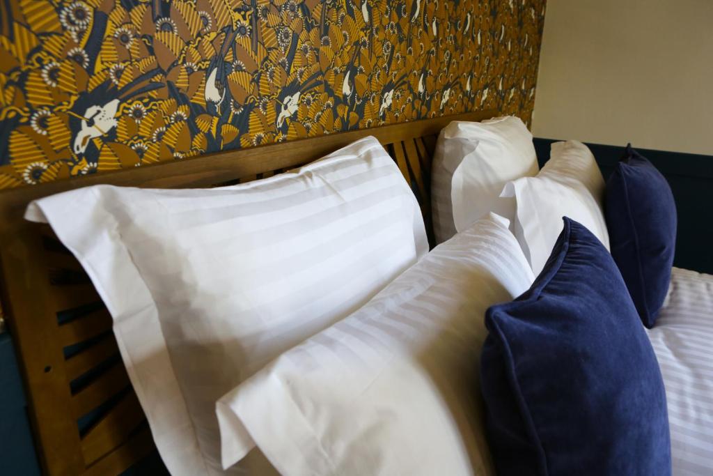 Postel nebo postele na pokoji v ubytování Arc en Sel Maison d’hôtes