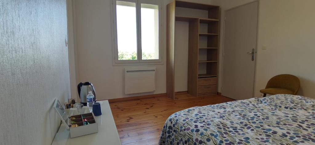Postel nebo postele na pokoji v ubytování Les Hauts de Grazac, Chambres et Tables d'hôtes