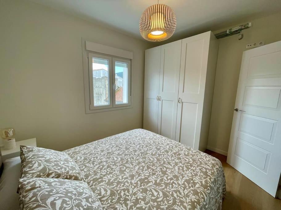 Posteľ alebo postele v izbe v ubytovaní Precioso y acogedor apto. en Noia. Recién renovado
