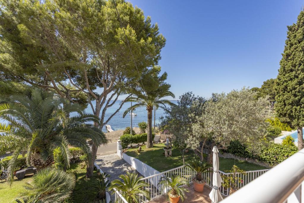 a view of the ocean from the balcony of a house at Bell Punt in Alcudia