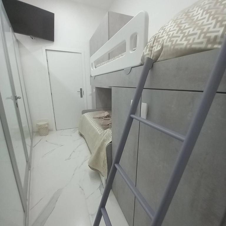 Łóżko lub łóżka w pokoju w obiekcie Othalan B&B