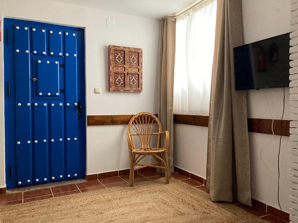 TV a/nebo společenská místnost v ubytování Hostal San Juan